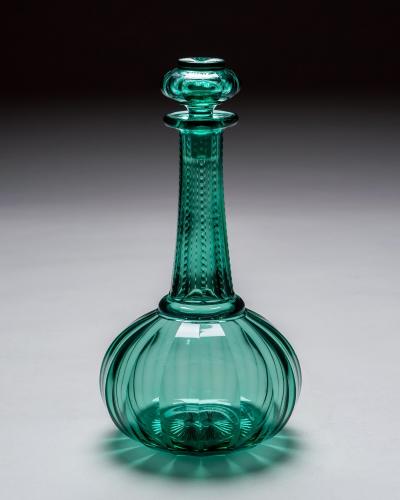 A PAIR OF GREEN SHAFT GLOBE DECANTERS