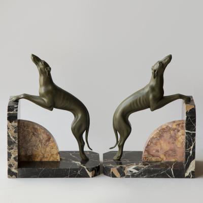 A PAIR OF LIMOUSIN PAINTED SPELTER SIGHTHOUND BOOKENDS