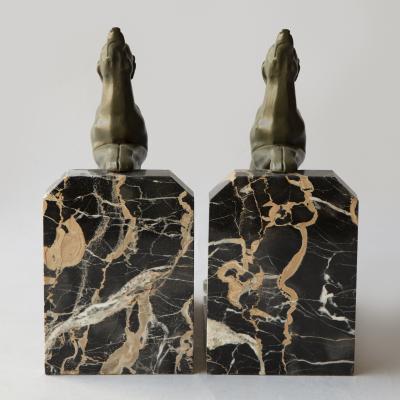 A PAIR OF LIMOUSIN PAINTED SPELTER SIGHTHOUND BOOKENDS