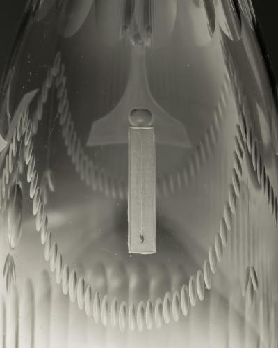 A PAIR OF MASONIC TAPERED DECANTERS