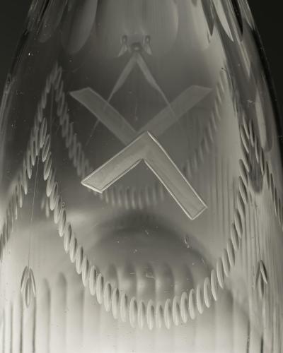 A PAIR OF MASONIC TAPERED DECANTERS