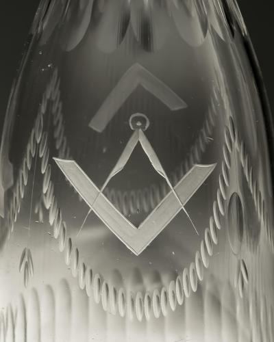 A PAIR OF MASONIC TAPERED DECANTERS