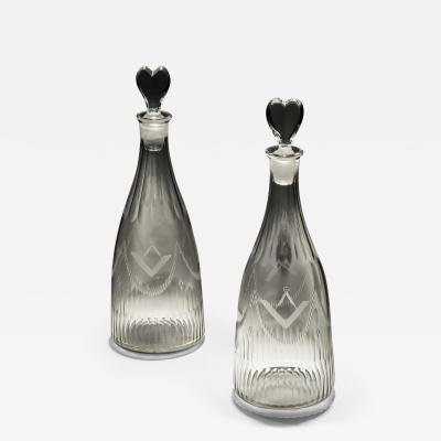 A PAIR OF MASONIC TAPERED DECANTERS