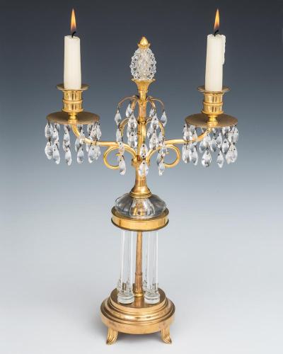 A PAIR OF ORMOLU AND GLASS TEMPLE CANDELABRA