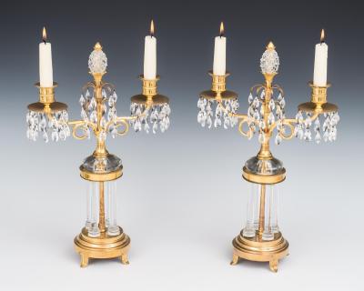A PAIR OF ORMOLU AND GLASS TEMPLE CANDELABRA
