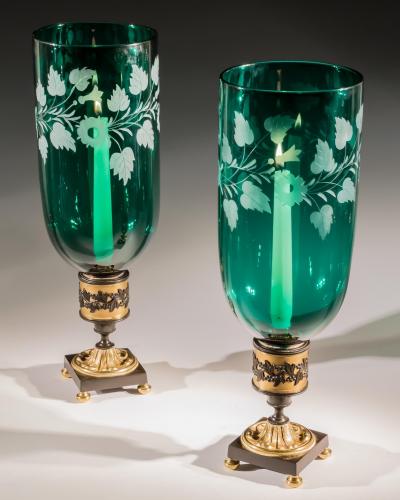 A PAIR OF ORMOLU BRONZE MOUNTED GREEN STORM SHADES