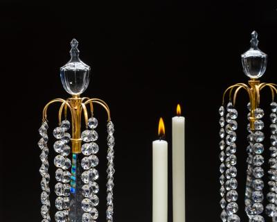 A PAIR OF ORMOLU GLASS REGENCY CANDELABRA