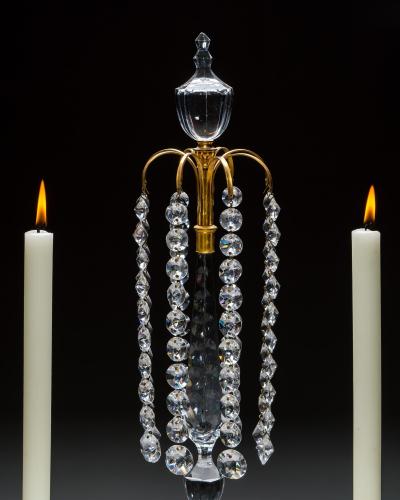 A PAIR OF ORMOLU GLASS REGENCY CANDELABRA