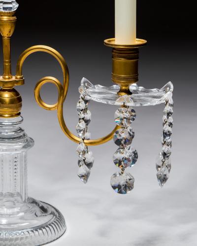 A PAIR OF ORMOLU GLASS REGENCY CANDELABRA