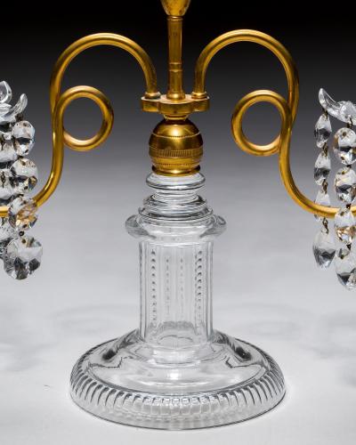 A PAIR OF ORMOLU GLASS REGENCY CANDELABRA