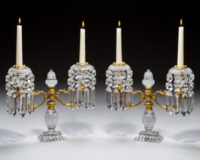 A PAIR OF ORNATE REGENCY CANDELABRA