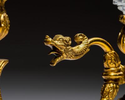 A PAIR OF ORNATE REGENCY CANDELABRA