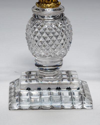 A PAIR OF ORNATE REGENCY CANDELABRA