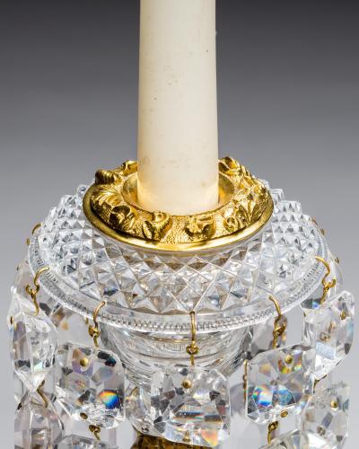 A PAIR OF ORNATE REGENCY CANDELABRA