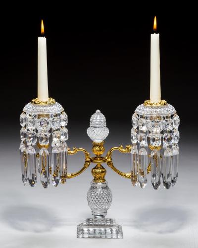 A PAIR OF ORNATE REGENCY CANDELABRA