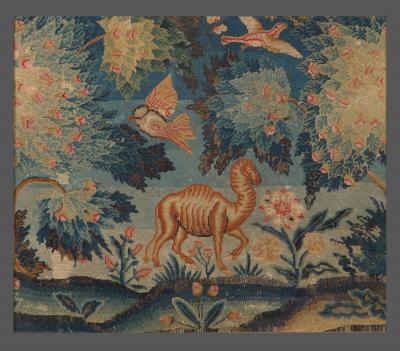 A PAIR OF PETIT POINT NEEDLEWORK PICTURES DEPICTING AN ELEPHANT AND A CAMEL