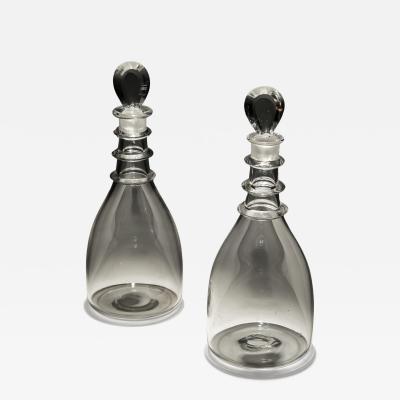 A PAIR OF PLAIN TAPERED GEORGIAN DECANTERS