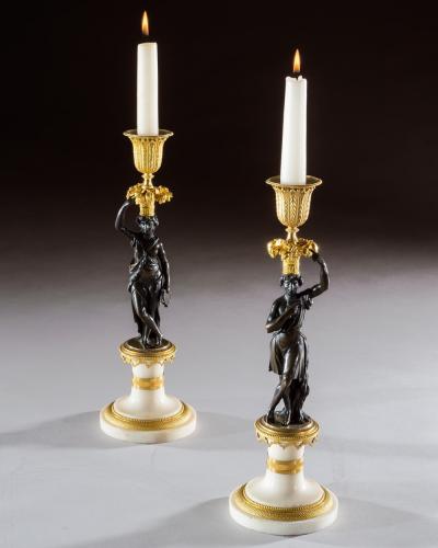 A PAIR OF REGENCY FIGURE CANDLESTICKS
