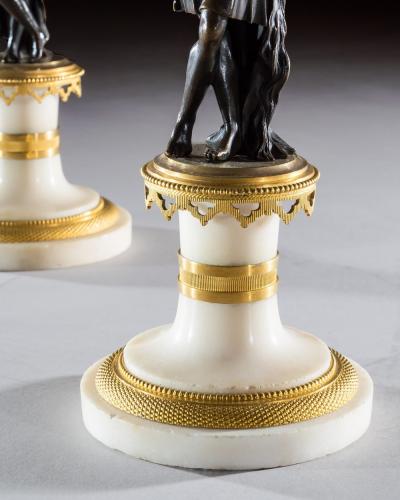 A PAIR OF REGENCY FIGURE CANDLESTICKS