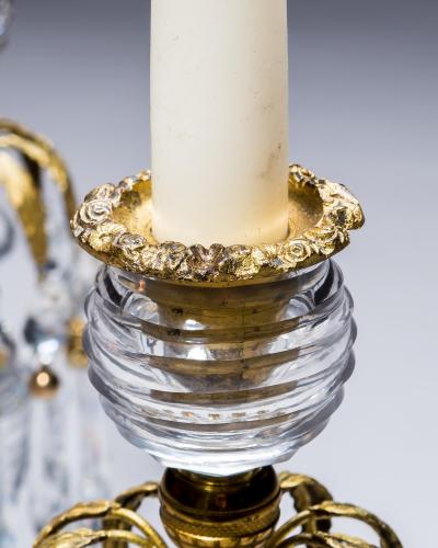 A PAIR OF REGENCY ORMOLU GLASS CANDLESTICKS