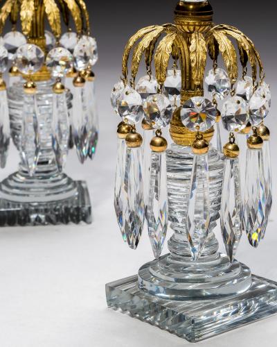A PAIR OF REGENCY ORMOLU GLASS CANDLESTICKS
