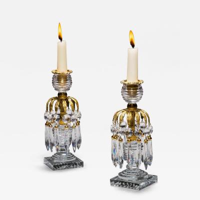A PAIR OF REGENCY ORMOLU GLASS CANDLESTICKS