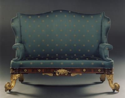 A PAIR OF ROSEWOOD SOFAS IN THE ANTIQUARIAN TASTE MOST UNUSUALLY SET