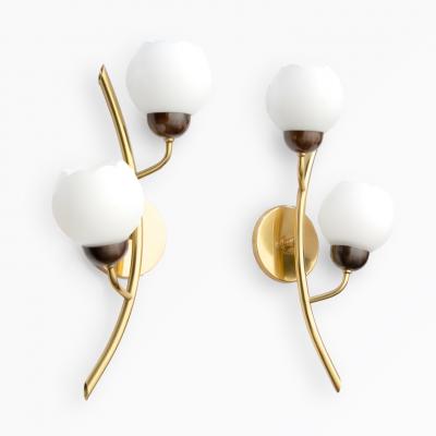 A PAIR OF SCANDINAVIAN POLISHED AND PATINATED SCONCES WITH OPALINE SHADES