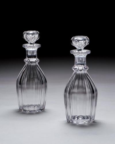A PAIR OF SLICE CUT WILLIAM IV CLUB DECANTERS