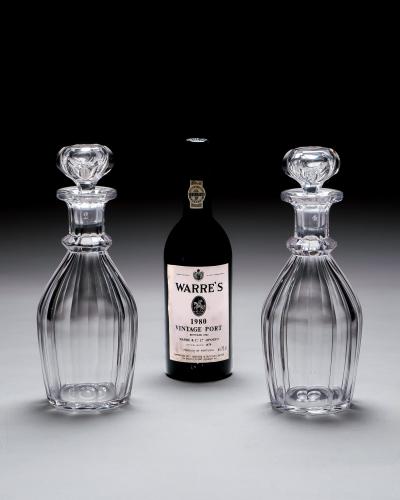 A PAIR OF SLICE CUT WILLIAM IV CLUB DECANTERS