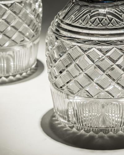 A PAIR OF STRAWBERRY DIAMOND CUT GEORGIAN DECANTERS
