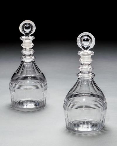 A PAIR OF TRIPLE RING REGENCY DECANTERS