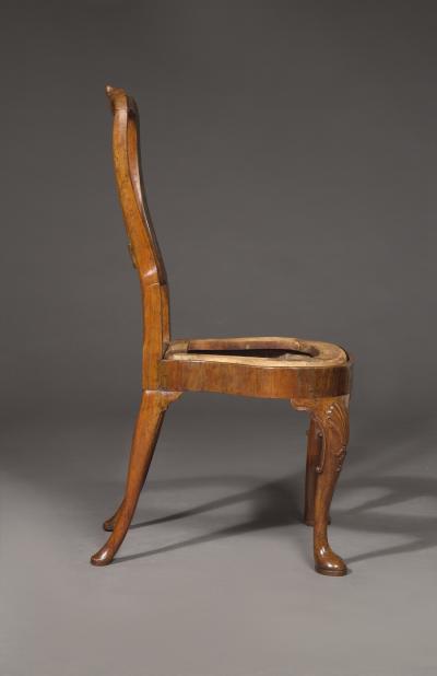 A PAIR OF WELL DRAWN FIGURED VENEER AND SOLID WALNUT EARLY GEORGE I SIDE CHAIRS