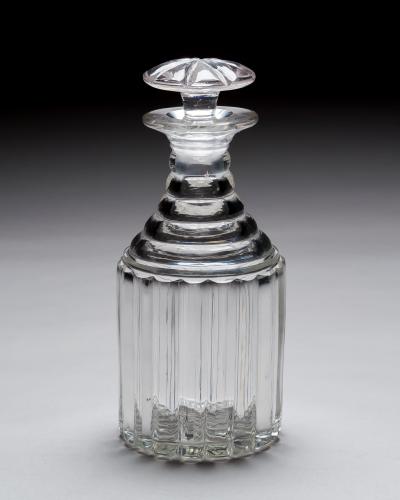 A PAIR OF WILLIAM IV PILLAR CUT DECANTERS