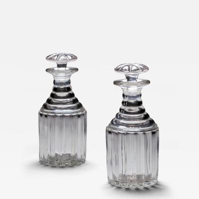 A PAIR OF WILLIAM IV PILLAR CUT DECANTERS