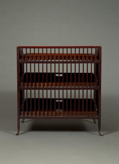 A PIERCED GEORGE III MAHOGANY FOLIO CABINET WITH DETACHABLE SLIDES