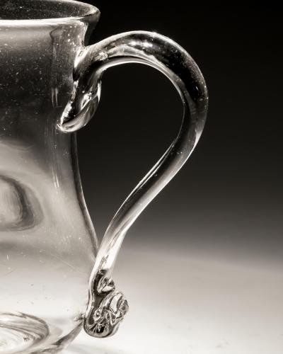 A PLAIN 18TH CENTURY GLASS MUG