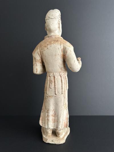 A Painted Pottery figure of male courtier