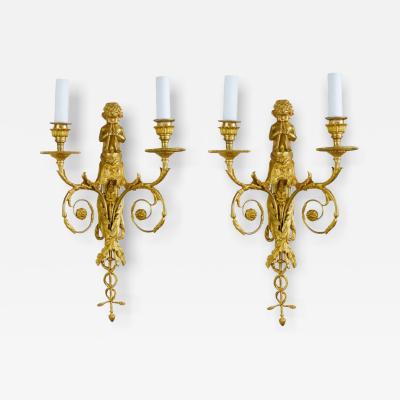 A Pair Of French Gilt Bronze Two Light Wall Appliques In The Louis XVI Style 