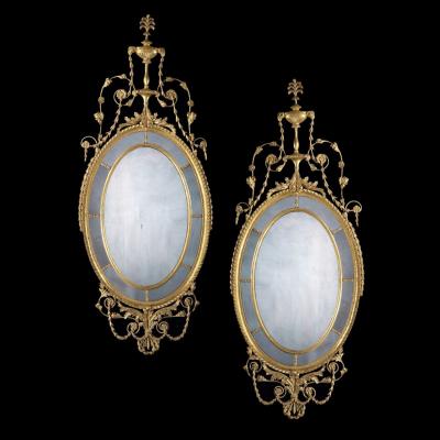 A Pair Of George III Adam Period Giltwood Mirrors