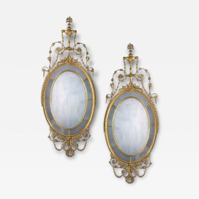 A Pair Of George III Adam Period Giltwood Mirrors