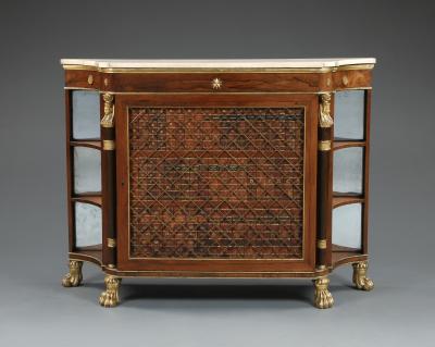 A Pair Of Regency Library Cabinets With Giltwood Detailing And Faux Book Panels