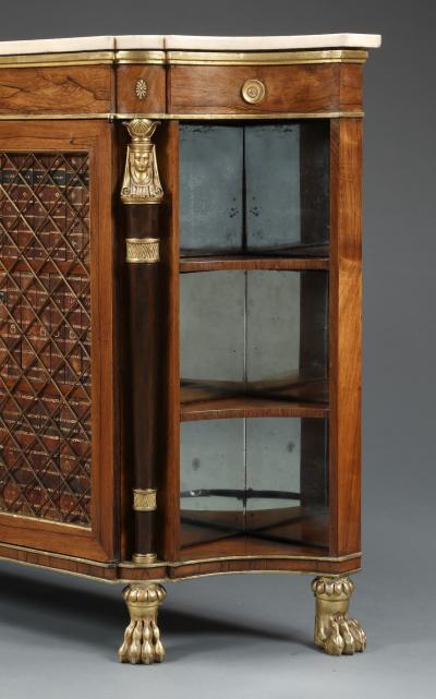 A Pair Of Regency Library Cabinets With Giltwood Detailing And Faux Book Panels