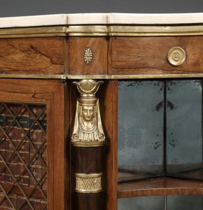 A Pair Of Regency Library Cabinets With Giltwood Detailing And Faux Book Panels