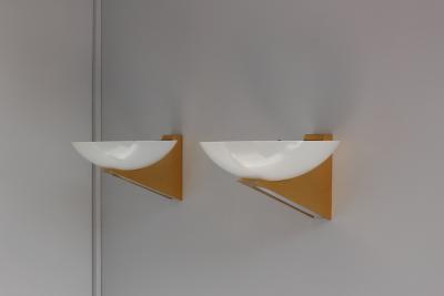 A Pair of 1950s Brass and Lucite Sconces