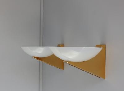 A Pair of 1950s Brass and Lucite Sconces