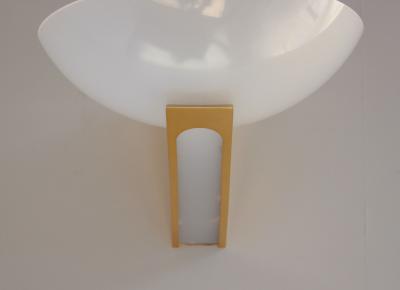 A Pair of 1950s Brass and Lucite Sconces