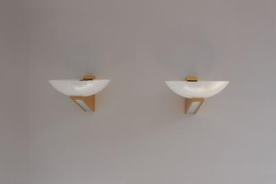 A Pair of 1950s Brass and Lucite Sconces