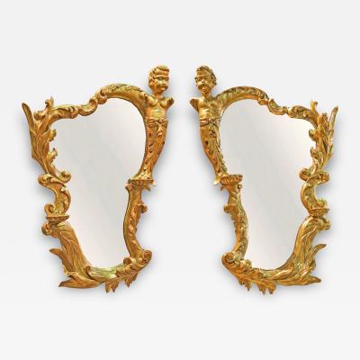 A Pair of 19th Century Italian Gilded Putti Mirrors