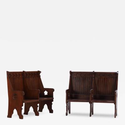 A Pair of American Gothic style carved oak double benches C 1900 